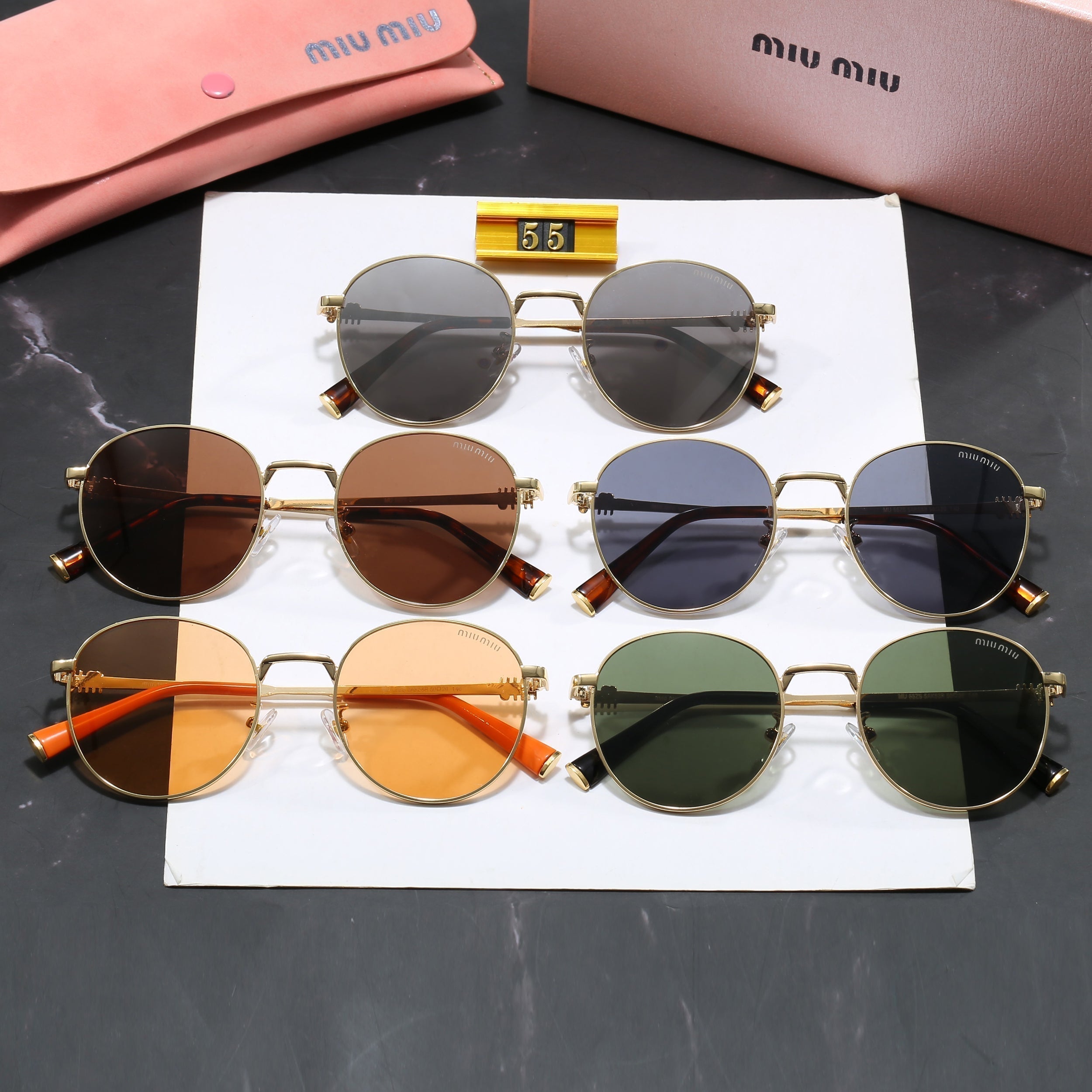 Miu Miu Round Sunglasses
