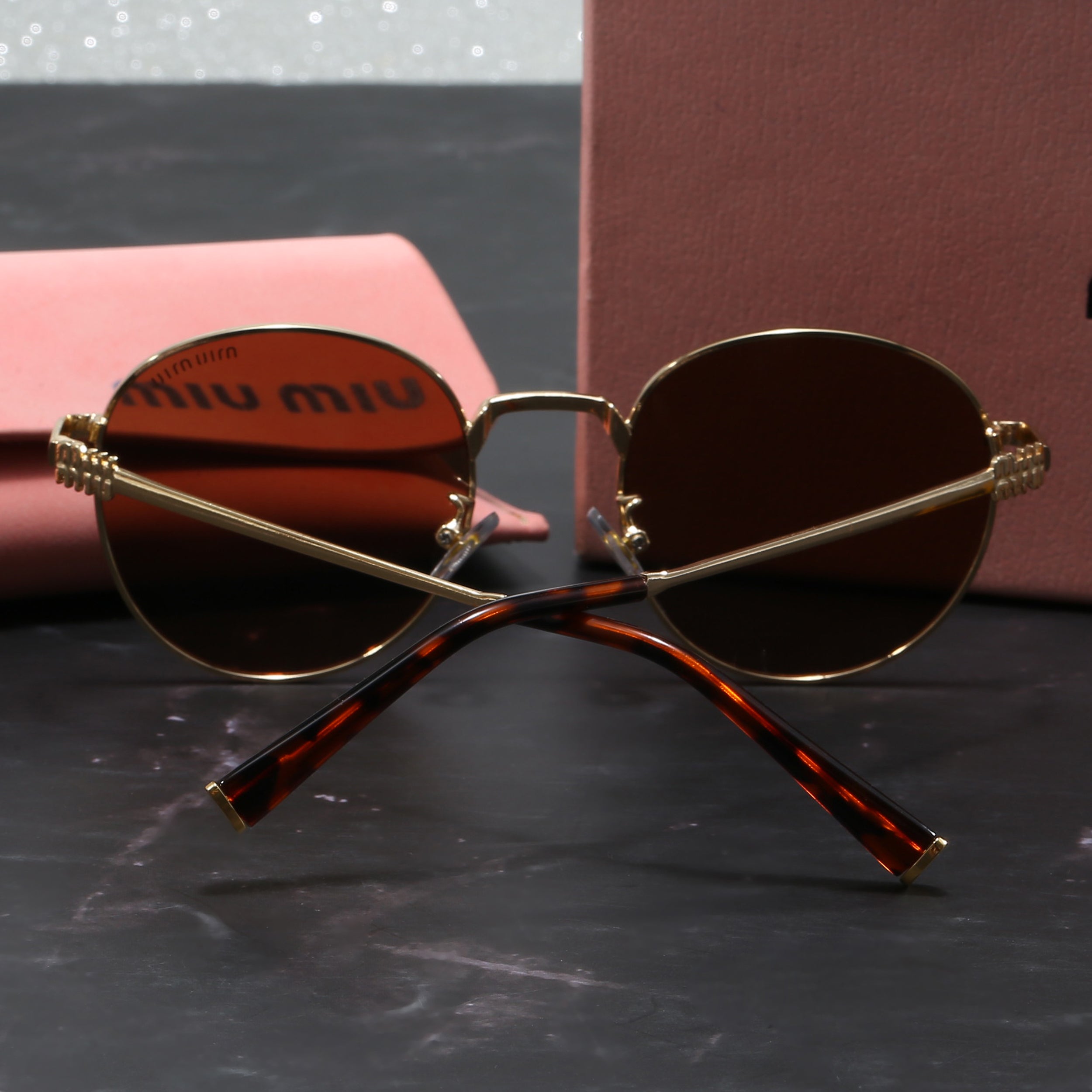 Miu Miu Round Sunglasses