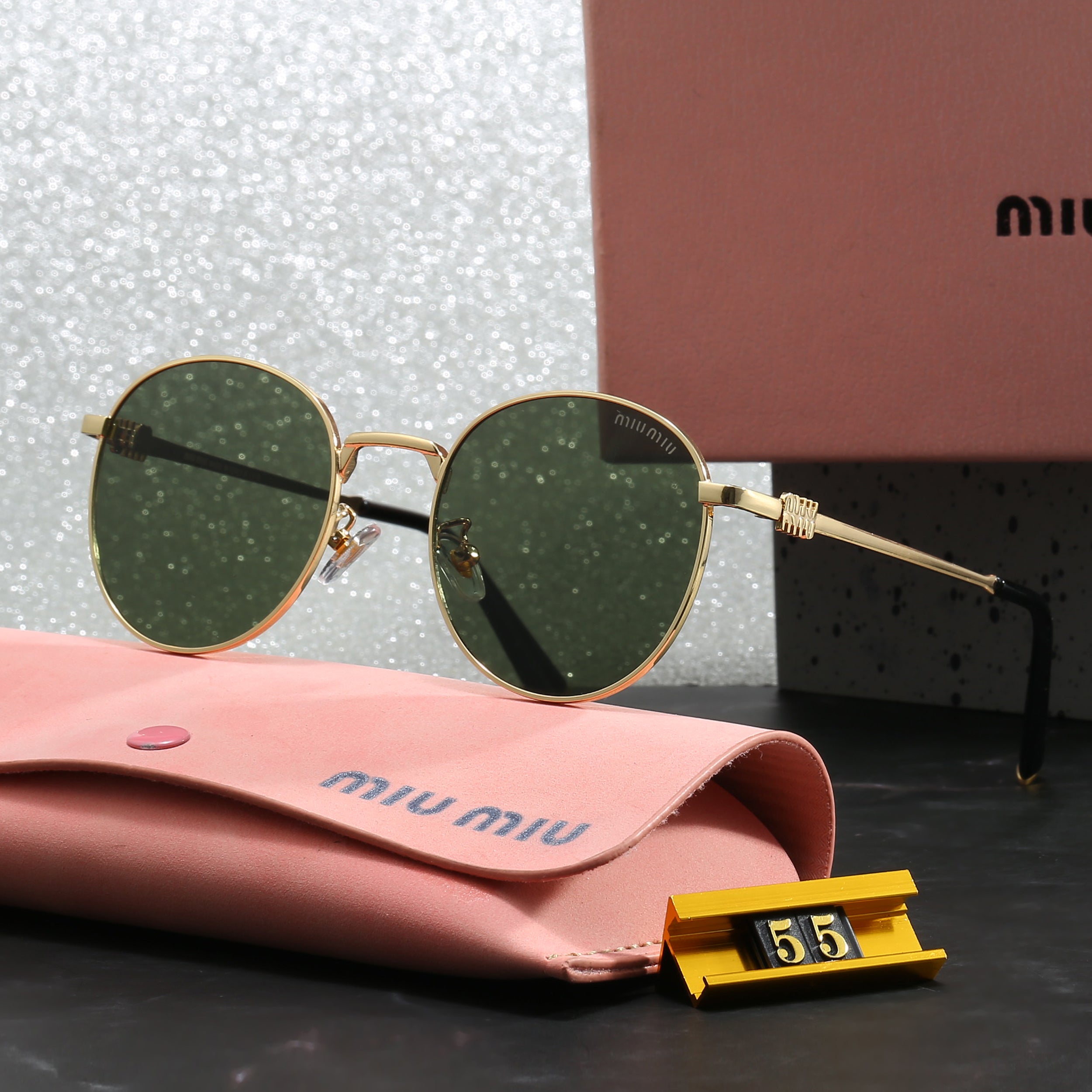 Miu Miu Round Sunglasses